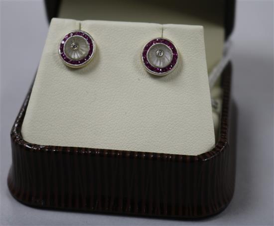 A pair of 1920s style 18ct white gold, ruby, diamond and rock crystal? domed top ear studs.